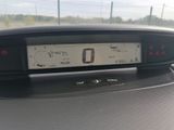 a car dashboard with a digital display on it