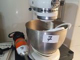 an image of a kitchen mixer on a table