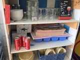 a shelf that has a lot of items on it