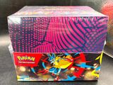 a close up of a box of pokemon cards on a table