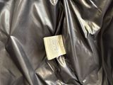 a piece of paper that is laying on top of a black cloth