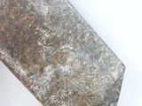 a large piece of metal that is sitting on a table