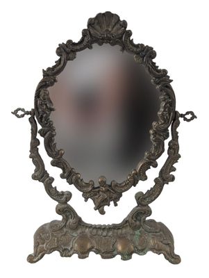 an image of a mirror on a stand with a mirror in the middle of it