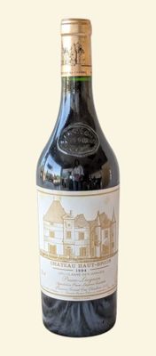 a bottle of wine that is sitting on a table