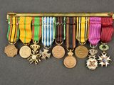 a display of medals and medals hanging on a wall