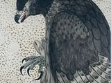 un oiseau assis sur une branche d'arbre