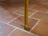 a metal bed frame sitting on the floor in a room