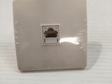 a picture of a white wall plate with a black and white picture on it