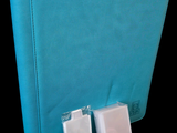 a blue folder with two usb drives attached to it