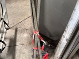 two ladders that are sitting next to each other