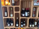 many bottles of wine on the shelves in the room