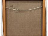 a close up of a picture of a wooden frame with a wire