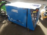 a blue machine that is sitting on the ground