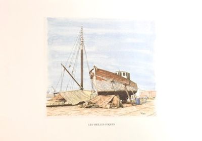 une photo d'un bateau échoué dans le sable