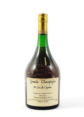 a bottle of wine that is sitting on a table