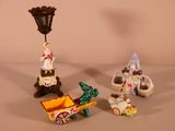 three figurines that are sitting on a table