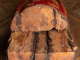 a piece of wood sitting on top of a wooden floor