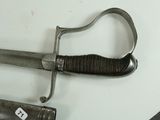 a knife that is laying on a table