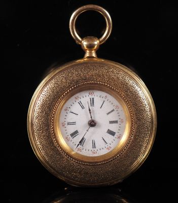 an image of a gold pocket watch with roman numerals on the face