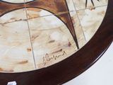 a close up of a table with a clock on it