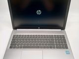 a laptop that is sitting on a white table