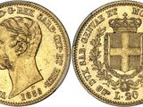 a gold sovereign coin with a crown on it