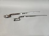 two tools that are sitting on a table