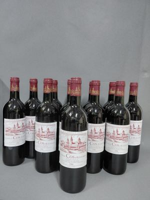 six bouteilles de vin rouge alignées sur une table