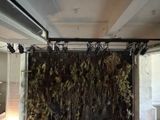 many dried plants hanging from the ceiling in a room