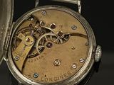 a pocket watch that is sitting on a table