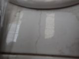 a close up view of a toilet with the lid down