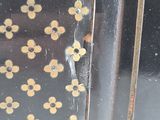 a close up of a metal object with holes in it