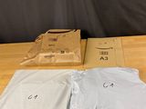 three bags of food sitting on a table next to each other