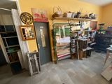 an image of a room with a lot of stuff on the floor