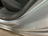 a close up of a car door handle with the door handle open