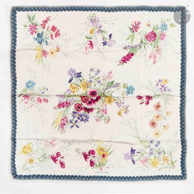 a close up of a floral print handkerchief on a white background