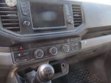 a car dashboard with a steering wheel and a control panel