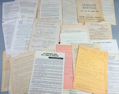 a pile of papers that are on a table