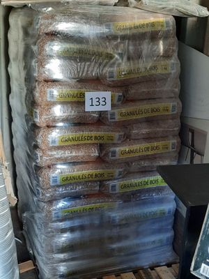 a stack of bread sitting on top of a pallet