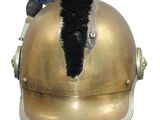a gold helmet with a blue feather on top