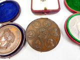 many different types of medals in this case