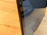an image of a microwave on a wooden table
