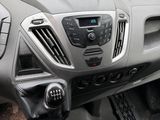 a dashboard view of a car with a steering control