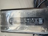a metal box that has a power cord attached to it