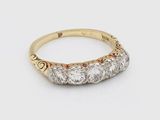 a gold and diamond ring