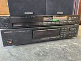 three sony cd players stacked on top of each other on a table