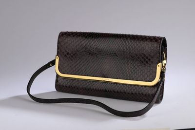 brown snake skin clutch bag with gold trim and strap