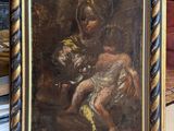 a picture of a painting of a woman holding a child