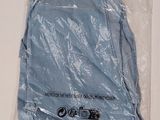 a plastic bag that has a pair of shoes in it