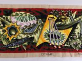 une image représentant une photo d'une nappe sur laquelle figure l'image d'un instrument de musique